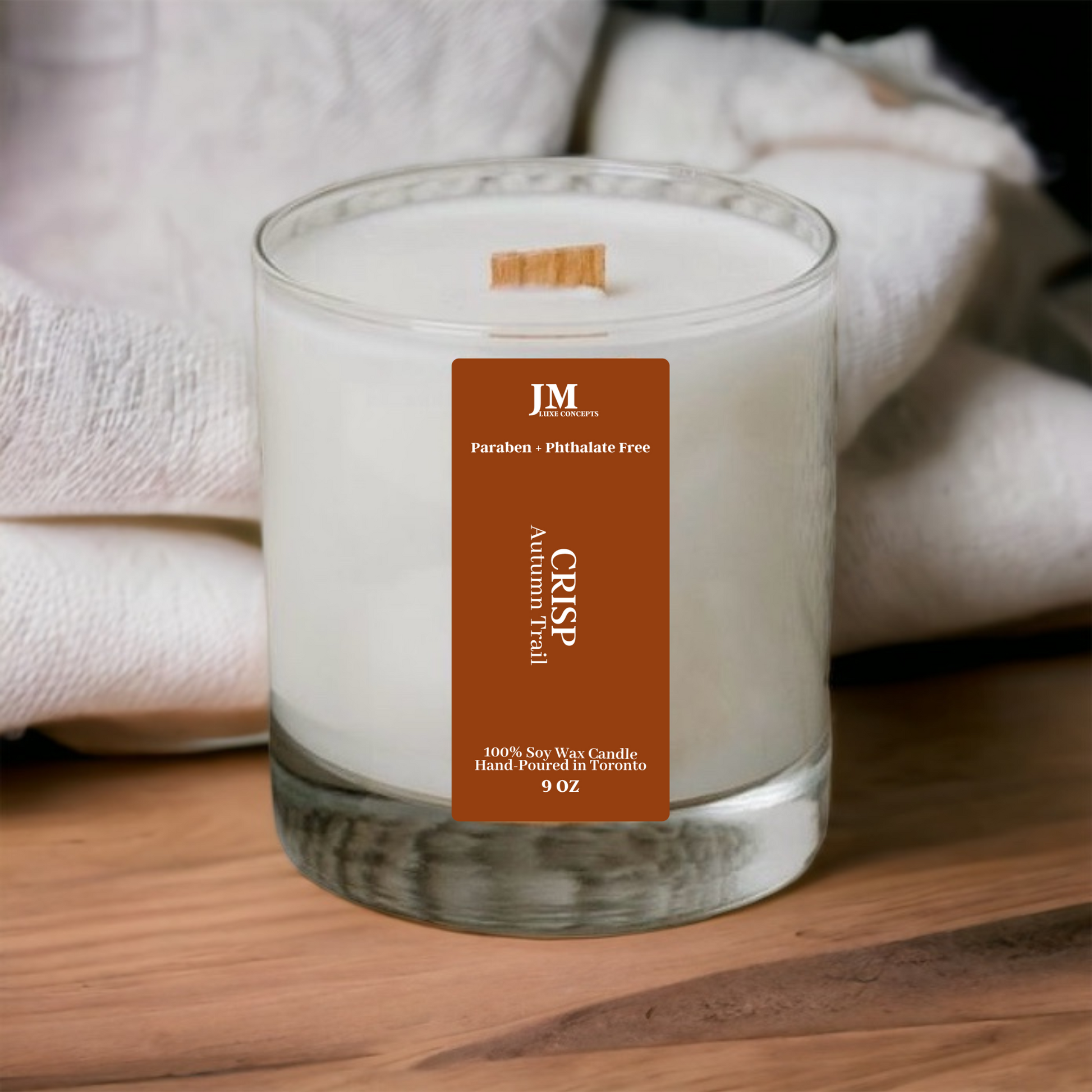 Autumn Trail scented soy candle in a sleek glass jar, emitting a warm and earthy fragrance with notes of cedarwood, amber, and crisp autumn leaves. Ideal for adding a cozy, fall-inspired ambiance to your home.